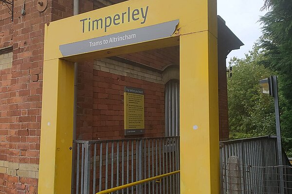 Wear and tear has left the Timperley sign a little less welcoming